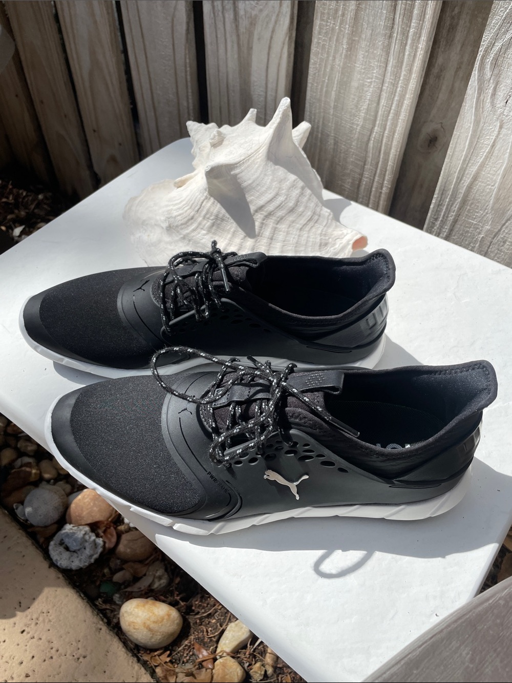 Puma Ignite Black and White Lace-Up Spikeless Golf Shoes.